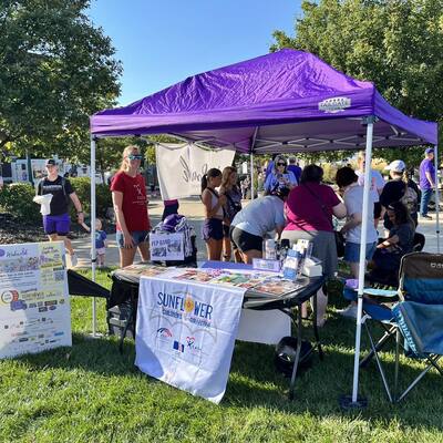 SCC offers face painting for the littlest attendees of Purple Power Play.